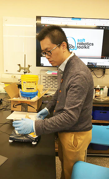 Golecki's grad student, Tianshi Fu, demonstrating soft robotics at Uni High's Agora Days. (Image courtesy of Holly Golecki.)